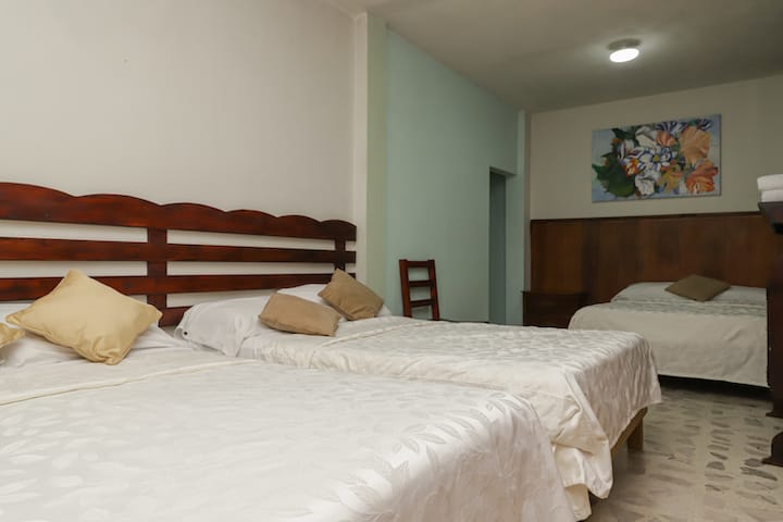 Hotel Bugambilias room with three beds